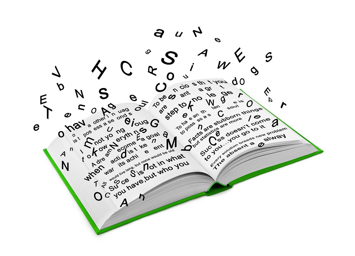 Bild von einem Buch und fliegenden Buchstaben