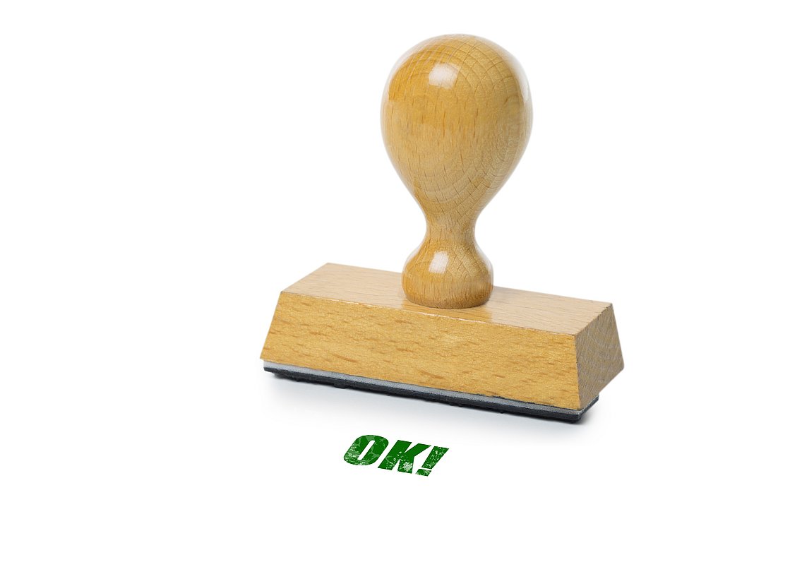 Ein Stempel mit der Aufschrift "OK".